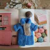...il cappotto azzurro in maglia...